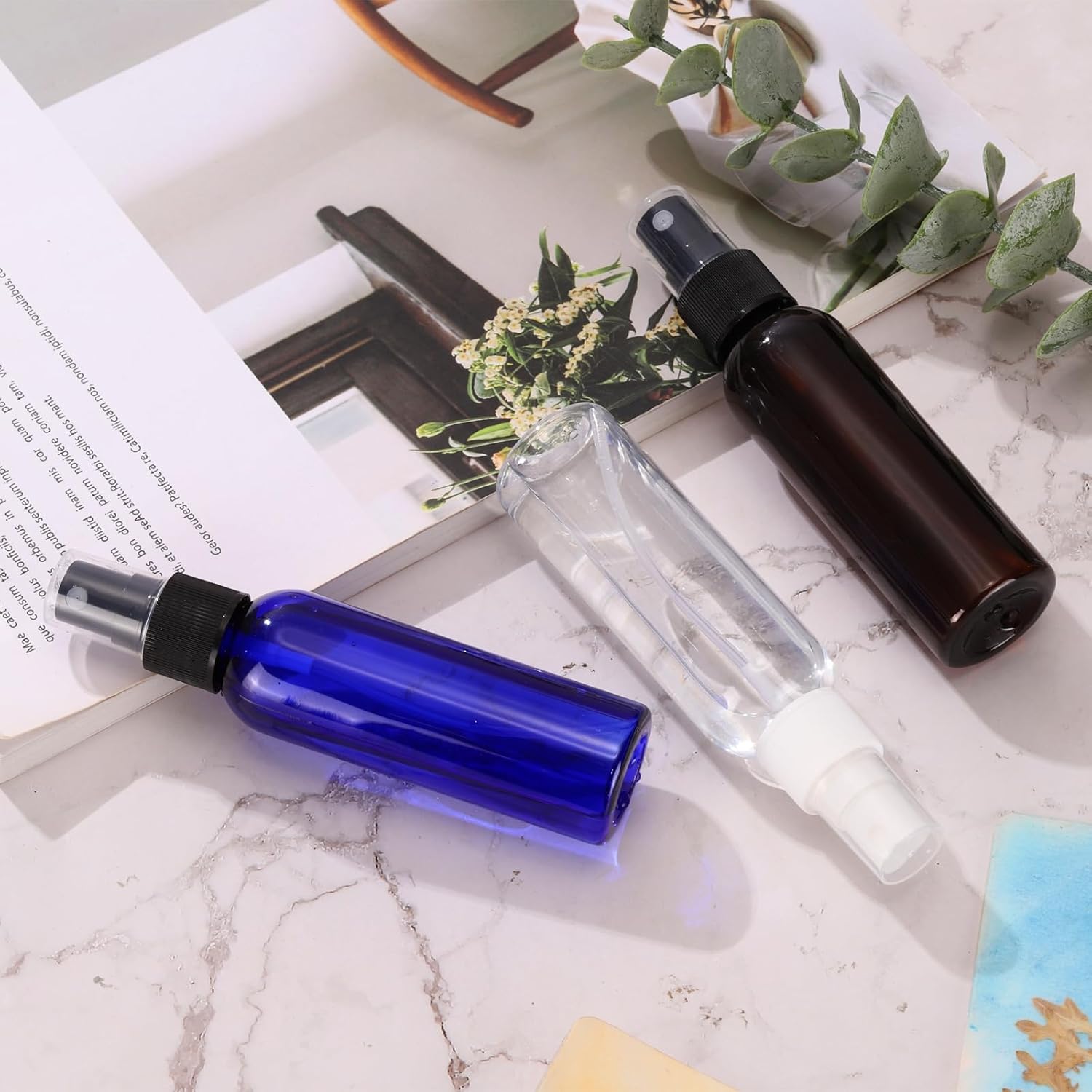 uxcell 10 Pack Spray Bottles, 2 Oz/60ML Reusable Clear Empty Mist Plastic Mini Travel Bottle Set,Small Refillable Liquid Containers for Household Use, Cleaning (Blue Black)