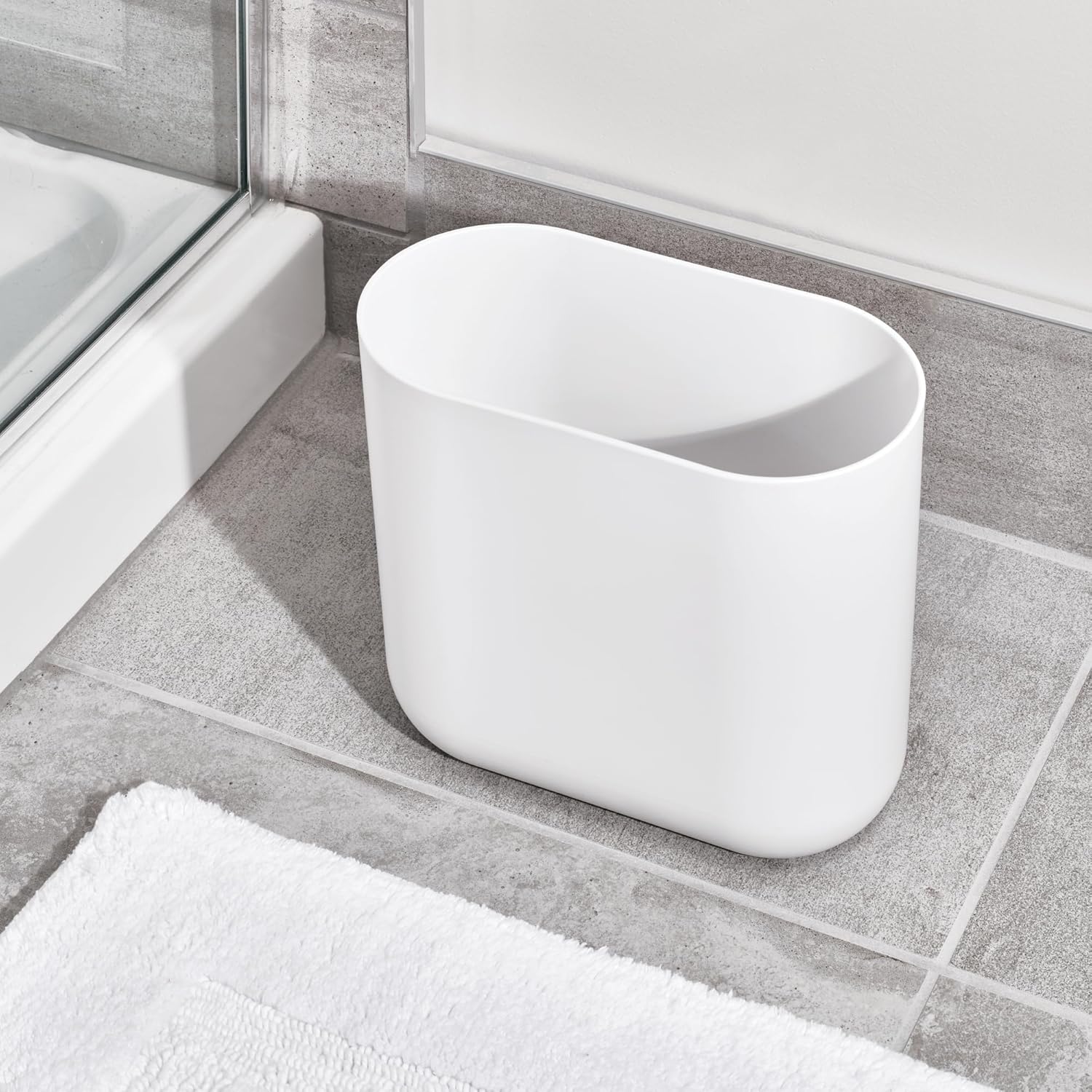 iDesign Slim Oval Plastic Waste Basket The Cade Collection, 10.56” x 5.5” x 9.77”, White