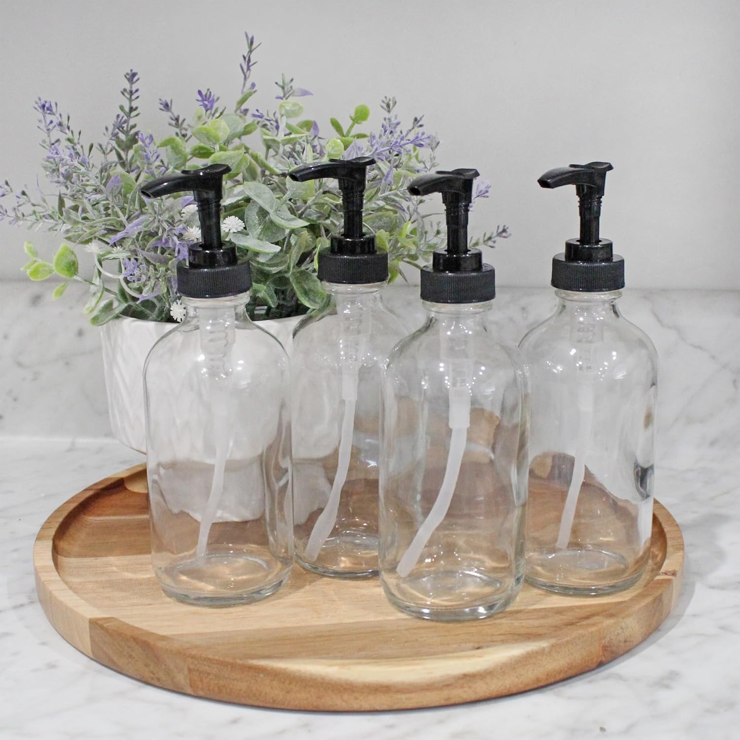 Cornucopia Brands 8oz Clear Glass Pump Bottles (4-Pack w/Black Plastic Pumps), Great as Essential Oil Bottles, Lotion Bottles, Soap Dispensers, and More